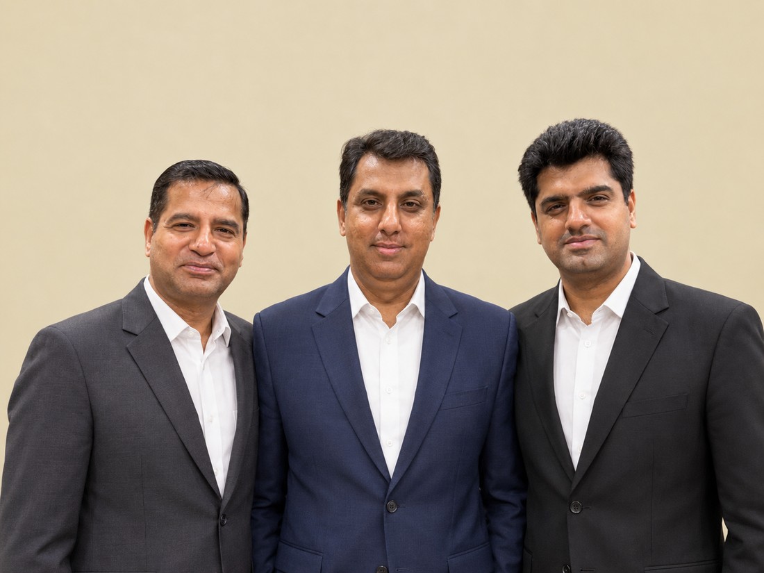 Mr. Anand Ahuja, Mr. Vikram Ahuja and Mr. Gautam Ahuja
